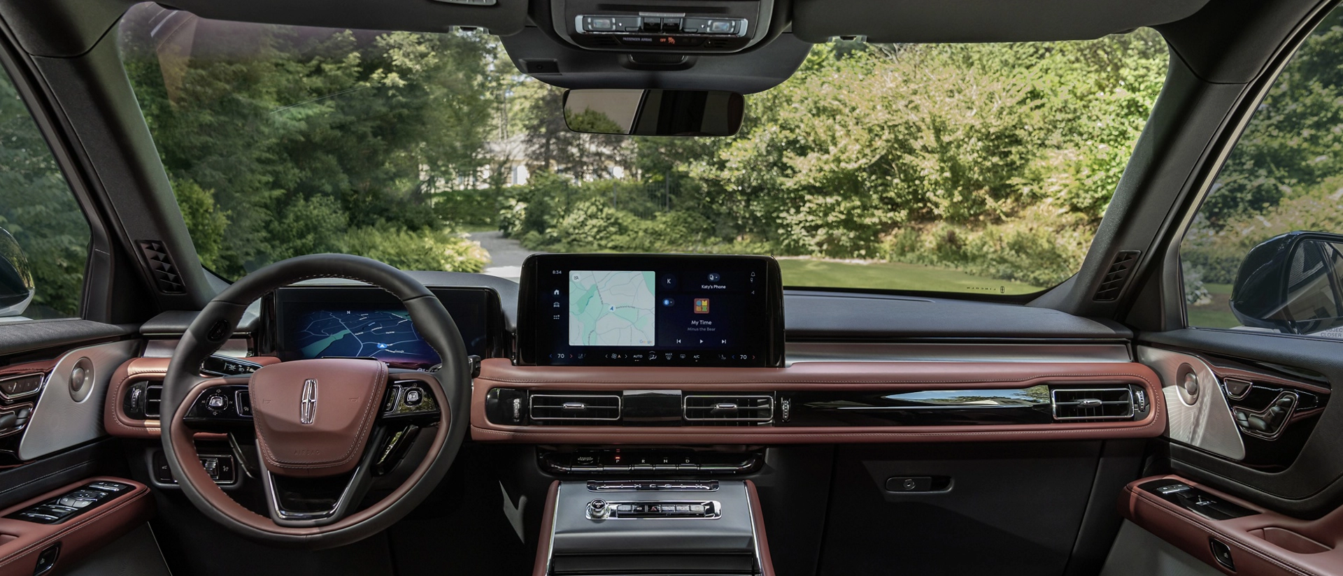 A couple sits in the front seats of a 2025 Lincoln Aviator® SUV