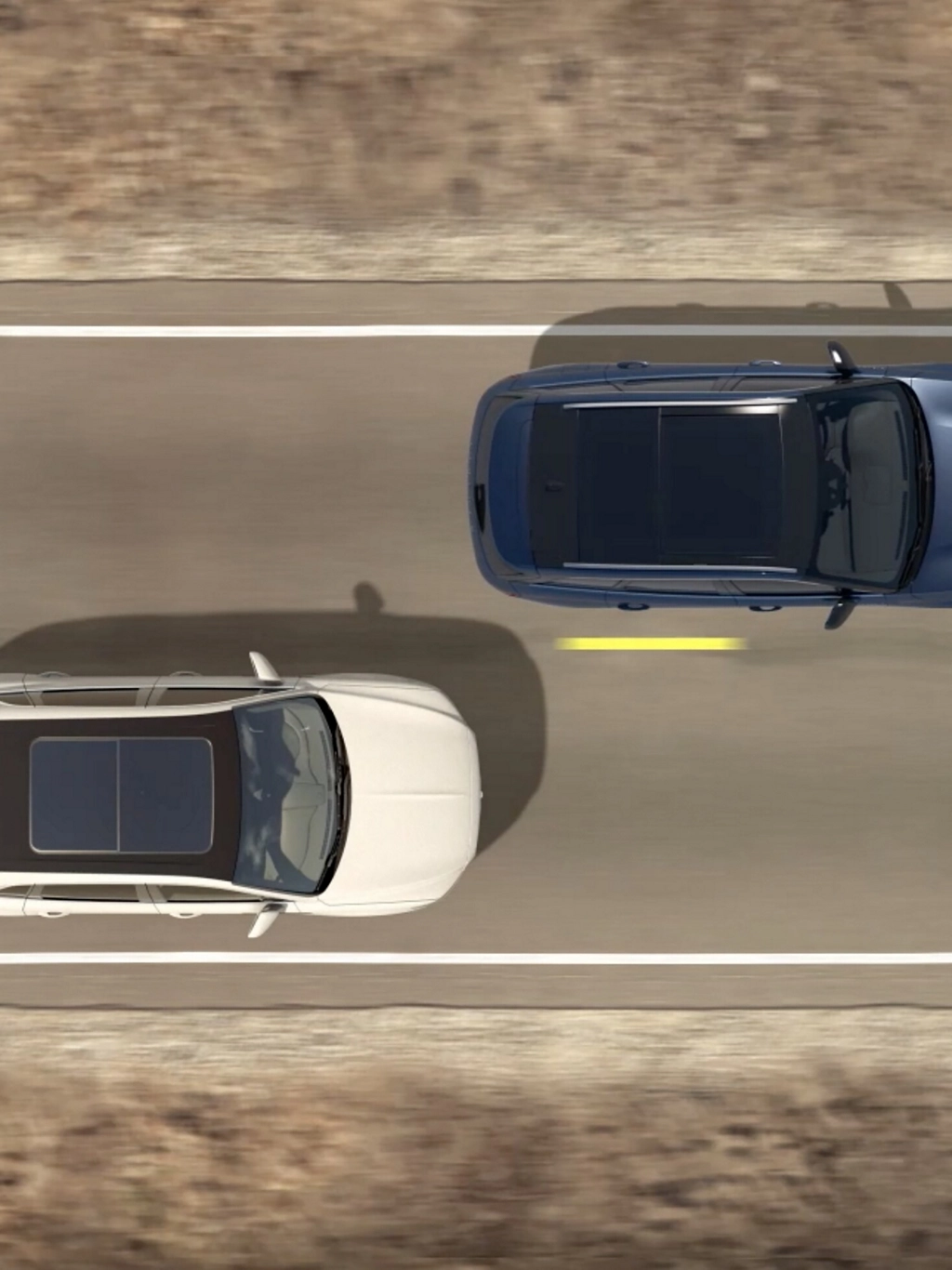 An overhead illustration of two cars being driven indicates how blind spot detection.