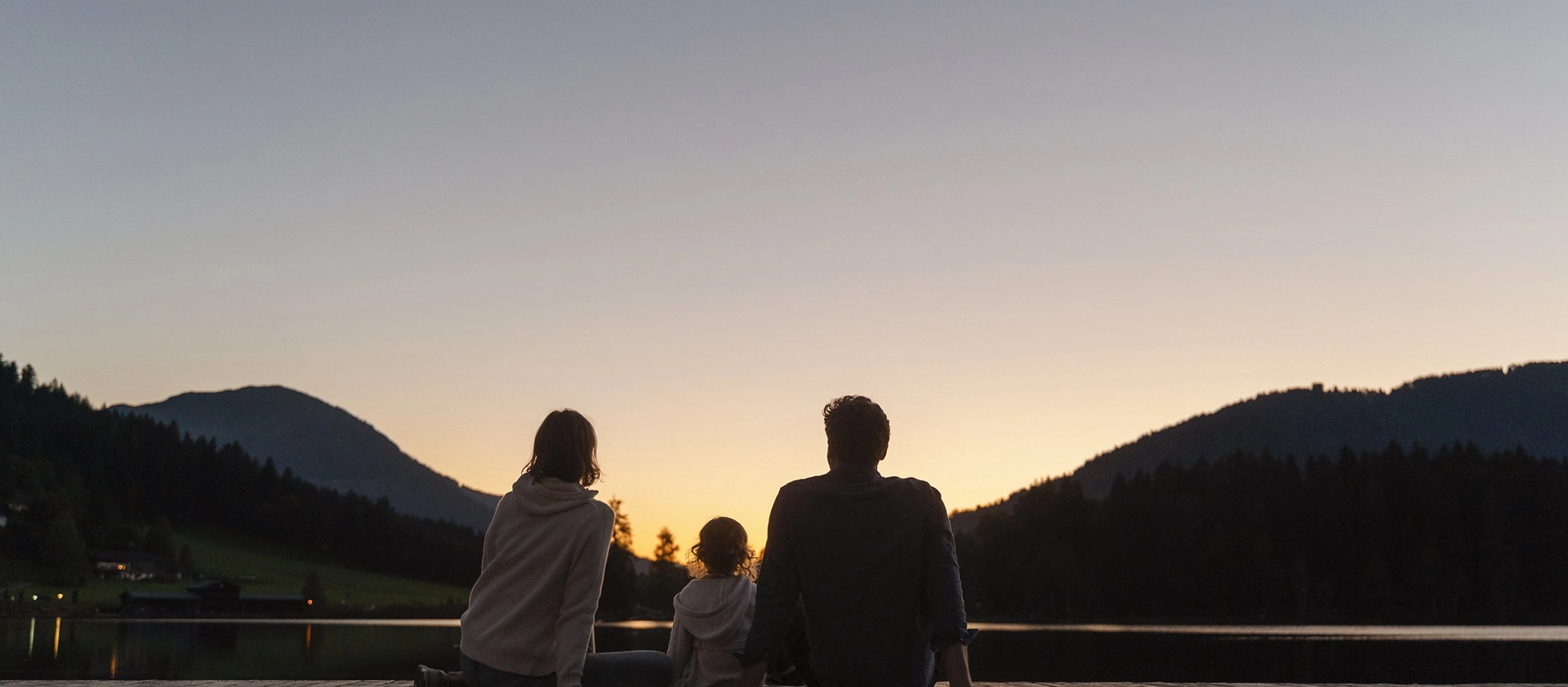  A family enjoys a sunset together