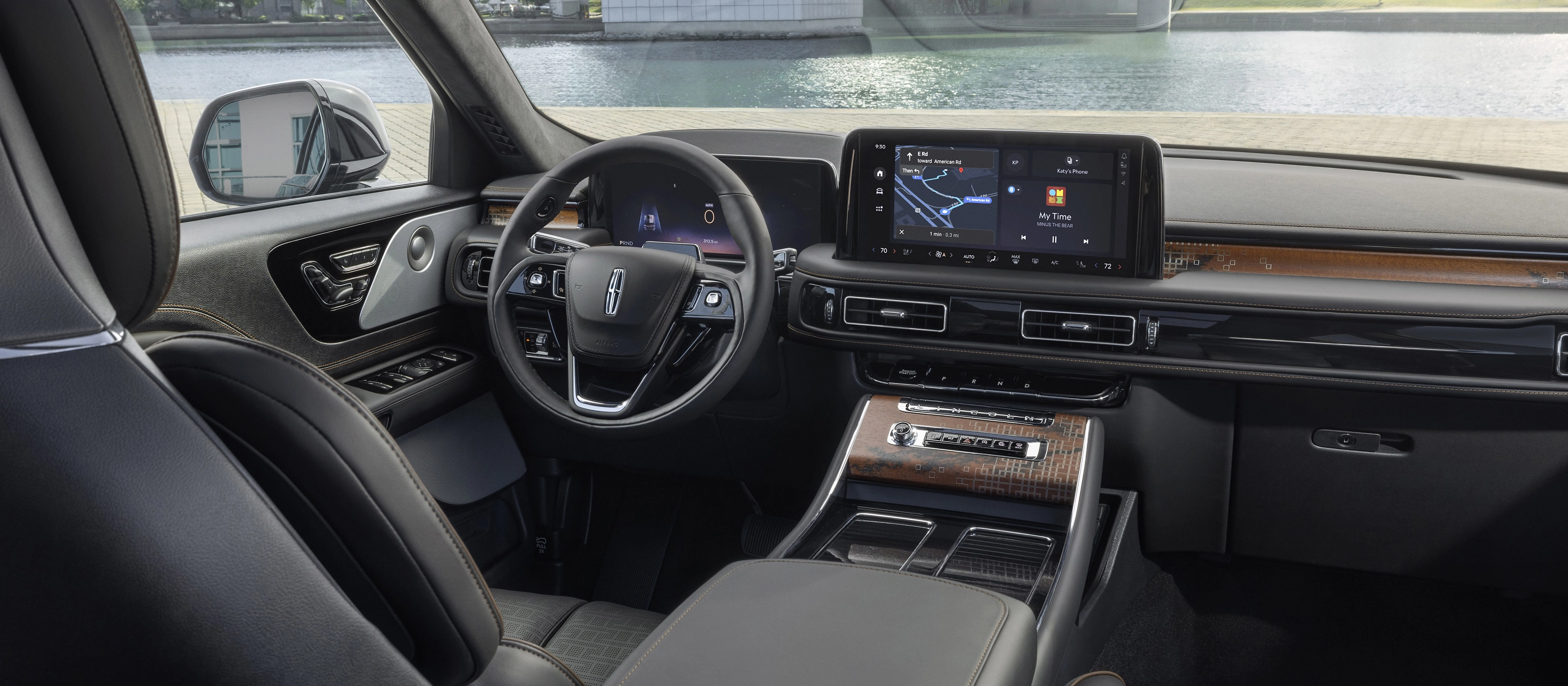 The front cabin of a 2025 Lincoln Black Label Nautilus® SUV is shown in the Invitation interior theme