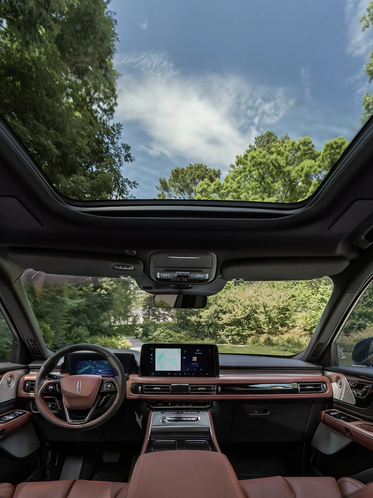 The interior of a 2026 Lincoln Aviator® SUV with the The panoramic Vista Roof