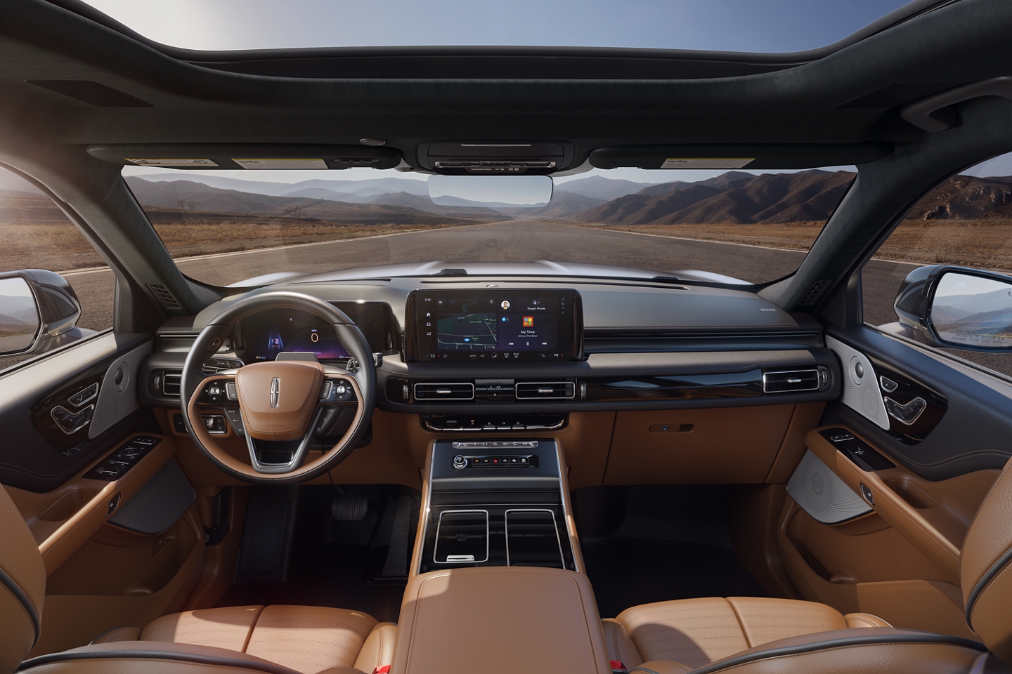 Se muestra la cabina delantera de una SUV Lincoln Black Label Aviator® 2025 con el tema de diseño interior Flight